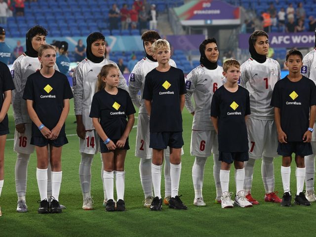 Iranian women’s soccer team refuse to sing national anthem in silent protest at Asian Cup