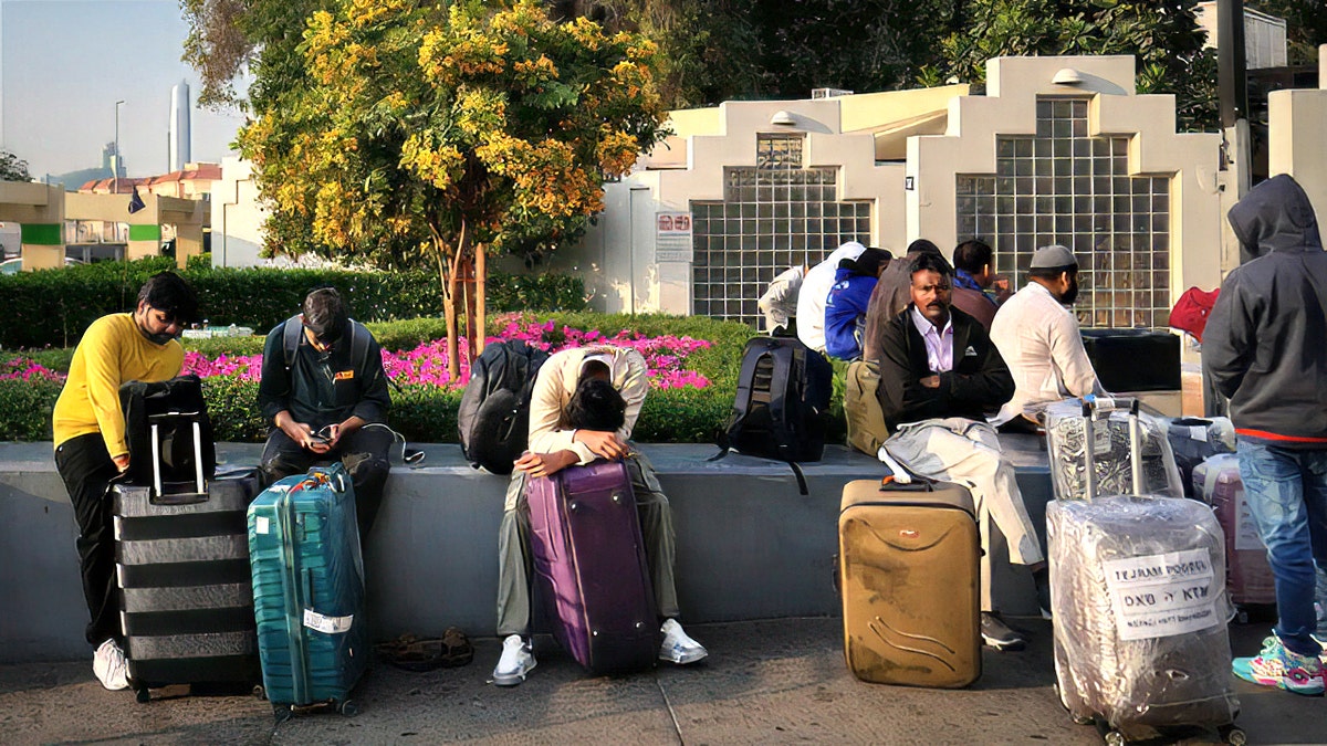 Americans stranded in Dubai face repeated flight cancellations amid Iran escalation  at george magazine