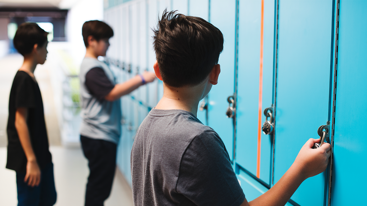 School board settles with boys accused of sexual harassment over transgender student locker room incident  at george magazine