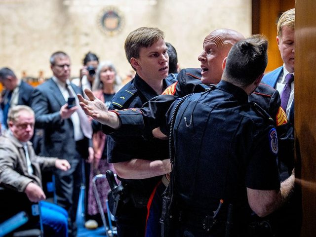 WATCH: Navy SEAL-turned-senator tackles ‘unhinged’ protester during chaotic hearing