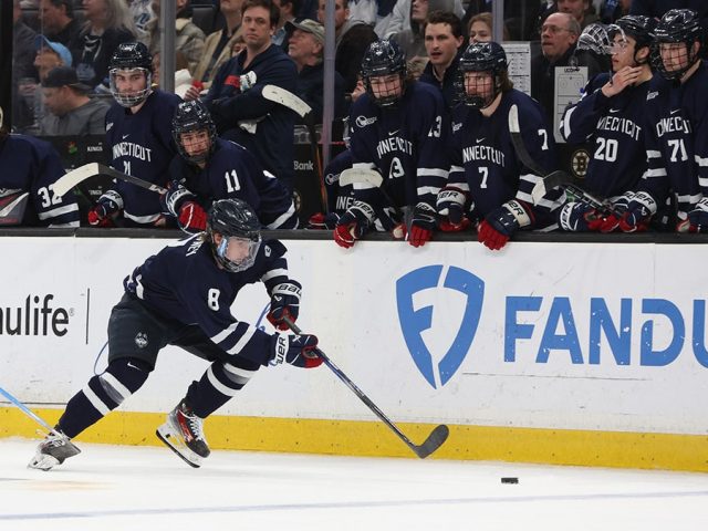 College hockey game thrown into chaos as lights turn off in arena during pivotal moment of OT