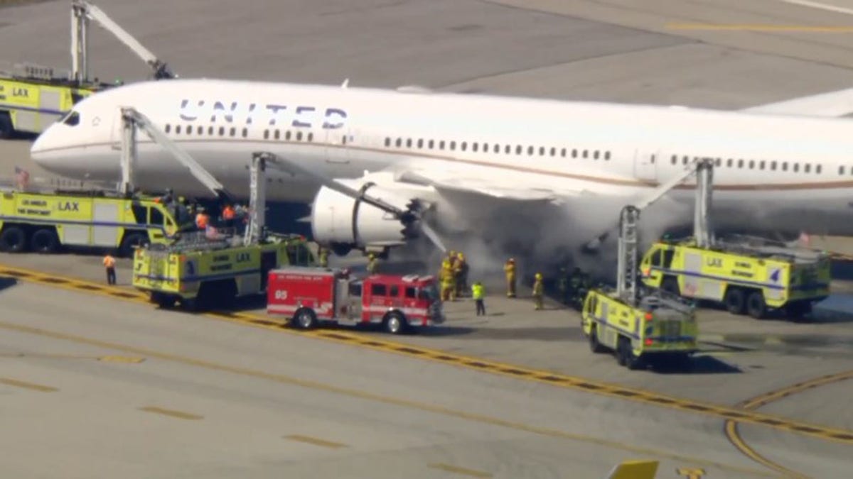New Jersey-bound United flight makes emergency landing at LAX after engine fire  at george magazine